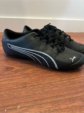 Puma Women's Black Sneakers with Silver Stripe